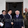 Phó Thủ tướng Trình Đình Dũng chào xã giao Tổng thống Ireland Michael Higgins. (Ảnh: Lê Phương/Vietnam+)