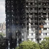 Tòa chung cư Grenfell Tower bị thiêu rụi trong vụ hỏa hoạn. (Nguồn: AFP/TTXVN)