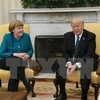 Tổng thống Mỹ Donald Trump và Thủ tướng Đức Angela Merkel. (Ảnh: EPA/TTXVN)