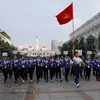 Đi bộ đồng hành cổ vũ Đoàn Thể thao Việt Nam tham dự SEA Games 29. (Ảnh: Hoàng Hải/TTXVN)