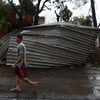 Cảnh đổ nát sau bão Maria tại San Juan, Puerto Rico ngày 20/9.(Nguồn: AFP/TTXVN)