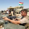 Các chiến binh người Kurd tại khu vực thị trấn Bashiqa. (Nguồn: AFP/TTXVN)