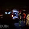 Hàng chục xe cấp cứu được điều đến hiện trường để đưa nạn nhân và người bị thương đến bệnh viện. (Ảnh: Thành Chung/TTXVN)