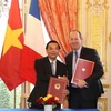 Lễ ký Ý định thư hợp tác giữa Bộ Khoa học và Công nghệ Việt Nam với Tập đoàn Airbus Defence and Space về công nghệ vũ trụ. Ảnh minh họa. (Ảnh: Trí Dũng/TTXVN)