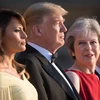 Thủ tướng Anh Theresa May và phu quân trong lễ đón Tổng thống Mỹ Donald Trump cùng phu nhân tới thăm Anh (Nguồn: Sky News)