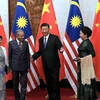 Chủ tịch Trung Quốc Tập Cận Bình và Phu nhân đón tiếp Thủ tướng Malaysia Mahathir Mohamad và Phu nhân ở Bắc Kinh, ngày 20/8. (Nguồn: straitstimes.com)