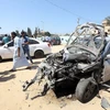 Hiện trường một vụ tấn công tại trạm kiểm soát ở thị trấn Zliten, Libya. (Nguồn: AFP/TTXVN)