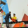 Vận động viên Nguyễn Thành Trung nhận huy chương vàng. (Ảnh: Đỗ Quyên/Vietnam+) 