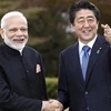 Thủ tướng Nhật Bản Shinzo Abe (phải) và Thủ tướng Ấn Độ Narendra Modi. (Nguồn: Reuters)
