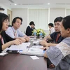 Các doanh nghiệp Việt Nam trao đổi về cơ hội cung ứng cho Tập đoàn AEON Nhật Bản tại Hội thảo. (Ảnh: Xuân Anh/TTXVN) 
