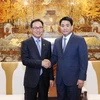 Chủ tịch Ủy ban nhân dân Thành phố Hà Nội Nguyễn Đức Chung tiếp ông Choi Joo Ho, Tổng giám đốc Tổ hợp Samsung Việt Nam. (Ảnh: Văn Điệp/TTXVN) 