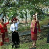 Vẻ đẹp của phụ nữ Thái nổi bật khi mặc trang phục truyền thống của dân tộc. (Ảnh: Phan Tuấn Anh/TTXVN)