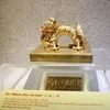 Các hiện vật tại trưng bày Quốc hiệu và Kinh đô Đại Việt qua các thời kỳ lịch sử. (Ảnh: Thành Đạt/TTXVN)