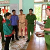 Cơ quan Công an thông qua quyết định khởi tố bị can đối với Nguyễn Thị Hảo. (Ảnh: Phan Quân/TTXVN)