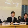 Thứ trưởng Bộ Tư pháp Nguyễn Khánh Ngọc (giữa) tại Geneva, Thụy Sĩ. (Ảnh: Hoàng Hoa/TTXVN)
