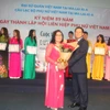 Những đóng góp của chị Trần Thị Trang được Đại sứ quán Việt Nam tại Malaysia ghi nhận. (Ảnh: Hoàng Nhương/Vietnam+)