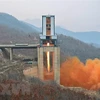 Một vụ thử động cơ tên lửa lực đẩy lớn của Triều Tiên tại bãi phóng vệ tinh Sohae ở tỉnh Bắc Pyongan. (Ảnh: Yonhap/TTXVN)