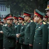 Bộ trưởng Bộ Quốc Ngô Xuân Lịch thăm Bộ Chỉ huy quân sự tỉnh Hòa Bình. (Ảnh: Trọng Đạt/TTXVN)