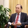 Thứ trưởng Bộ Ngoại giao Nguyễn Quốc Dũng, Trưởng SOM ASEAN Việt Nam trả lời phỏng vấn Thông tấn xã Việt Nam về các hoạt động chung của ASEAN 2020. (Ảnh: Văn Điệp/TTXVN)