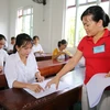 Thí sinh tại điểm thi trường THPT Diễn Châu 2, huyện Diễn Châu bước vào môn thi Ngữ Văn. (Ảnh: Bích Huệ/TTXVN)