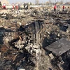 Hiện trường vụ rơi máy bay chở khách của Hãng hàng không quốc tế Ukraine ở gần Tehran, Iran ngày 8/1. (Nguồn: AFP/TTXVN)