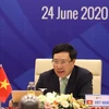 Phó Thủ tướng, Bộ trưởng Bộ Ngoại giao Phạm Bình Minh chủ trì Hội nghị không chính thức Bộ trưởng Ngoại giao ASEAN, ngày 24/6 vừa qua. (Ảnh: Văn Điệp/TTXVN)
