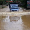 Mưa lớn khiến nhiều tuyến đường giao thông của huyện Lục Yên bị ngập nặng. (Nguồn: TTXVN)