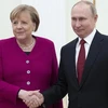Thủ tướng Đức Angela Merkel và Tổng thống Nga Vladimir Putin. (Nguồn: AP) 