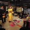 Nghệ nhân Hoàng Đức Dục trình diễn nghi lễ cúng nhà mới trong thực hành Then ở huyện Ba Bể, tỉnh Bắc Kạn. (Nguồn: Vietnam+) 