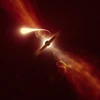Hình ảnh do Tổ chức Nghiên cứu thiên văn châu Âu tại Nam Bán cầu công bố ngày 12/10/2020, cho thấy một ngôi sao bị "xé vụn" và hút vào bên trong hố đen. (Nguồn: AFP/TTXVN)
