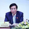 Tổng Thư ký, Chủ nhiệm Văn phòng Quốc hội Nguyễn Hạnh Phúc chủ trì họp báo. (Ảnh: Trọng Đức/TTXVN)