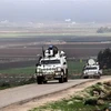 Lực lượng gìn giữ hòa bình của Liên hợp quốc tại Liban tuần tra dọc khu vực biên giới Liban-Israel gần thành phố Marjayoun, Liban. (Nguồn: AFP/TTXVN) 