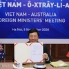 Phó Thủ tướng, Bộ trưởng Bộ Ngoại giao Phạm Bình Minh ký Chương trình hành động chung giai đoạn 2021-2023 giữa Bộ Ngoại giao hai nước. (Ảnh: Lâm Khánh/TTXVN)