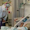 Bệnh nhân COVID-19 được điều trị tại bệnh viện ở Safed, Israel, ngày 19/11/2020. (Ảnh: THX/TTXVN)