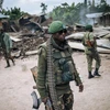Binh sỹ Cộng hòa Dân chủ Congo tuần tra tại làng Manzalaho gần Beni. (Ảnh: AFP/TTXVN) 