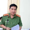 Đại tá Nguyễn Sỹ Quang, Phó Giám đốc Công an Thành phố Hồ Chí Minh trả lời câu hỏi của các cơ quan báo chí. (Ảnh: Thành Chung/TTXVN)