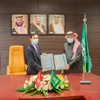 Đại sứ Việt Nam tại Saudi Arabia Vũ Viết Dũng và ông Abdullah Fahd Al Hussain, Chủ tịch Hãng thông tấn Saudi Arabia (SPA) đã chính thức ký Bản ghi nhớ về hợp tác và trao đổi thông tin giữa TTXVN và SPA. (Nguồn: TTXVN)