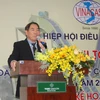 Ông Phạm Văn Công, Chủ tịch Hiệp hội Điều Việt Nam phát biểu khai mạc hội nghị. (Ảnh: Xuân Anh/TTXVN)