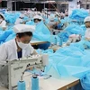 Sản xuất hàng dệt may xuất khẩu của Việt Nam. (Nguồn: TTXVN)