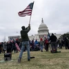 Người biểu tình ủng hộ Tổng thống Donald Trump tập trung gần tòa nhà Quốc hội ở Washington DC., hôm 6/1. (Ảnh: THX/TTXVN)