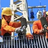 Việt Nam đang hướng tới mục tiêu xây dựng thị trường điện cạnh tranh. (Ảnh: TTXVN phát)