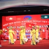 Tiết mục biểu diễn văn nghệ của bà con cộng đồng người Việt tại Macau (Trung Quốc) chào mừng xuân Tân Sửu. (Ảnh: Lê Anh /TTXVN)