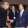 Thủ tướng Nguyễn Xuân Phúc gặp Cao uỷ Liên minh châu Âu về Đối ngoại và Chính sách an ninh Federica Mogherini tại lễ khai mạc Hội nghị cấp cao Á-Âu (ASEM) lần thứ 12, ngày 18/10/2018 ở Brussels (Bỉ). (Ảnh: Thống Nhất/TTXVN) 