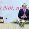 Thủ tướng Nguyễn Xuân Phúc chủ trì hội nghị. (Ảnh: Thống Nhất/TTXVN)