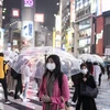 Người dân đeo khẩu trang phòng dịch COVID-19 tại Tokyo, Nhật Bản, ngày 5/3/2021. (Ảnh: AFP/ TTXVN)