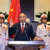 Chủ tịch nước Nguyễn Xuân Phúc tuyên thệ nhậm chức. (Ảnh: Thống Nhất/TTXVN) 