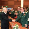Tổng Bí thư Nguyễn Phú Trọng với các đại biểu tham dự Lễ kỷ niệm. (Ảnh: Trọng Đức/TTXVN)