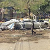 Hiện trường một vụ rơi máy bay trực thăng tại Philippines. (Ảnh: AP) 