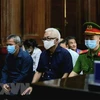 Các bị cáo tại phiên tòa ngày 27/11. (Ảnh: Thành Chung/TTXVN) 