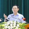 Chủ tịch Quốc hội Vương Đình Huệ trình bày chương trình hành động tại huyện Tiên Lãng. (Ảnh: Doãn Tấn/TTXVN) 